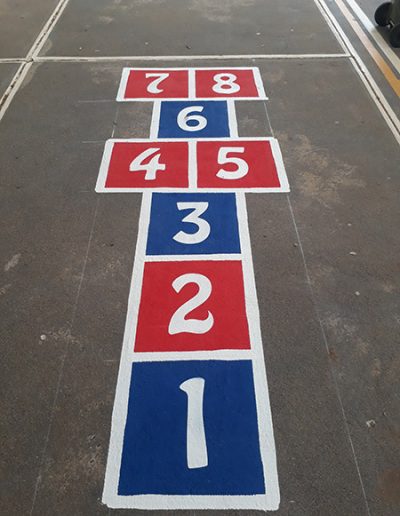 The Coloured Hopscotch is the basic hopscotch grid that children are still drawn to the colours.