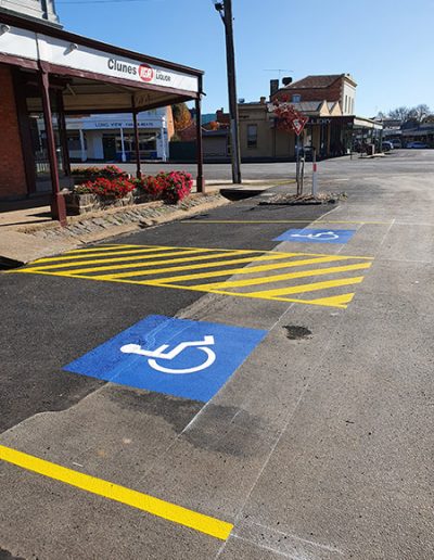 On street two disabled carparks with a walkway section between the two parks.