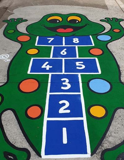 The Hopscotch Frog is just a basic grid of hopscotch that has been transformed into a wonderfully bright and colourful frog shape that the kids will be drawn to.