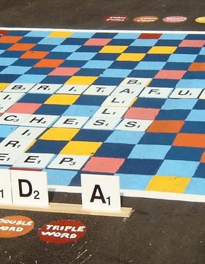 Scrabble pieces used with an outdoor scrabble board.