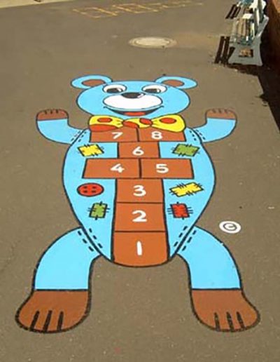 The Teddy Bear Hopscotch is just a basic grid of hopscotch that has been transformed into a wonderfully bright, colourful and interesting character that the kids will be drawn to.